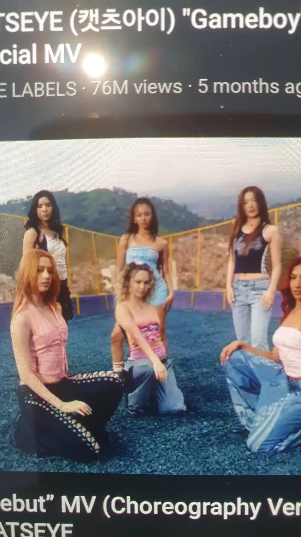 ai character: KATSEYE  background