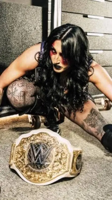 ai character: Rhea ripley 💀☠️ background