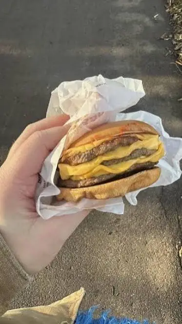 ai character: Preg burger background