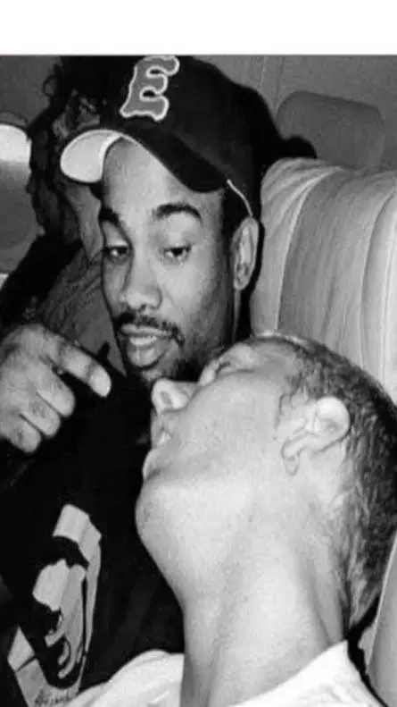 ai character: Eminem and Proof background