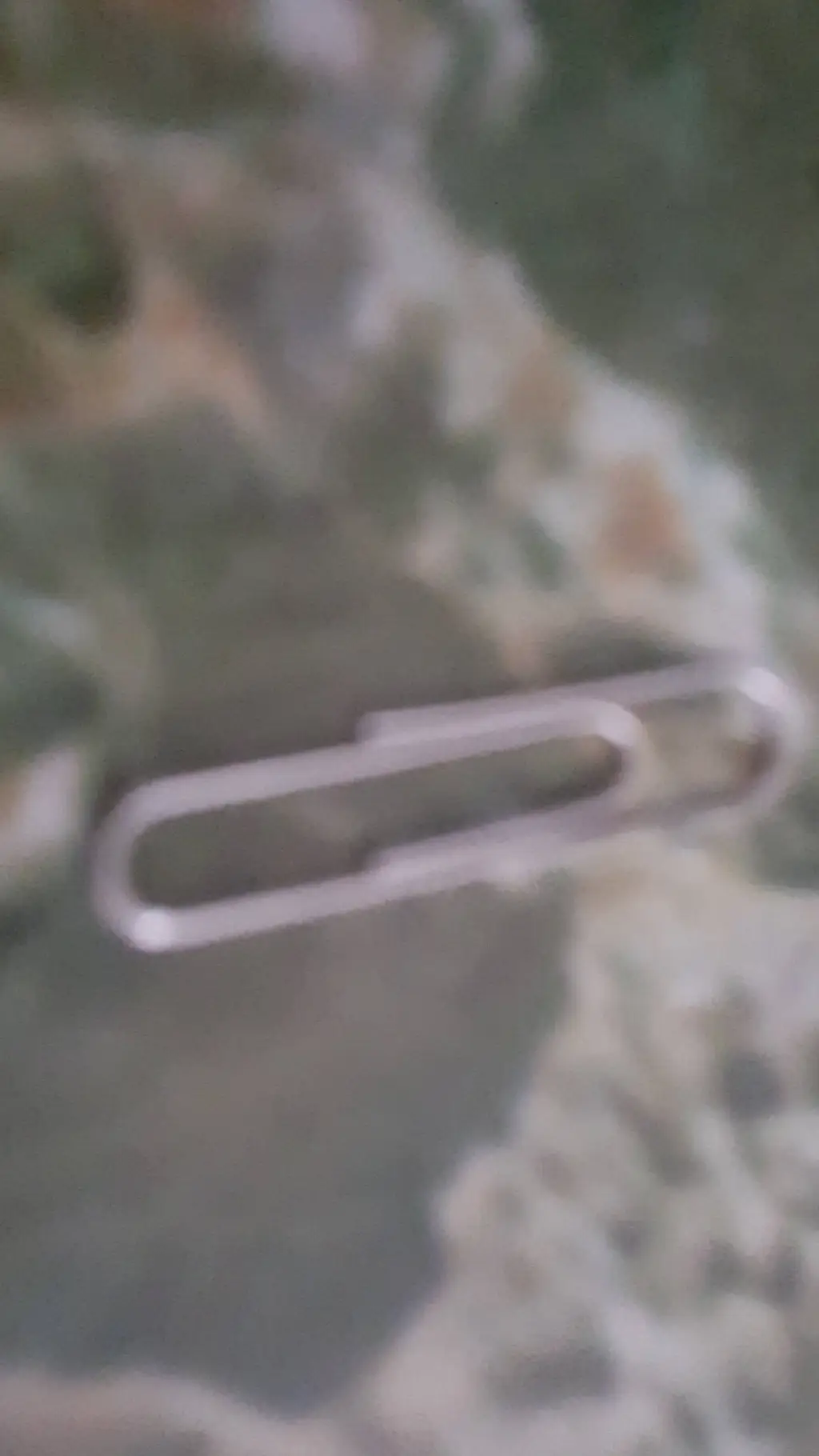 ai character: just a paper clip background