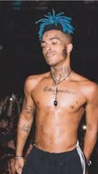 ai character: 🖤💜 XXXTENTACION💜🖤 background