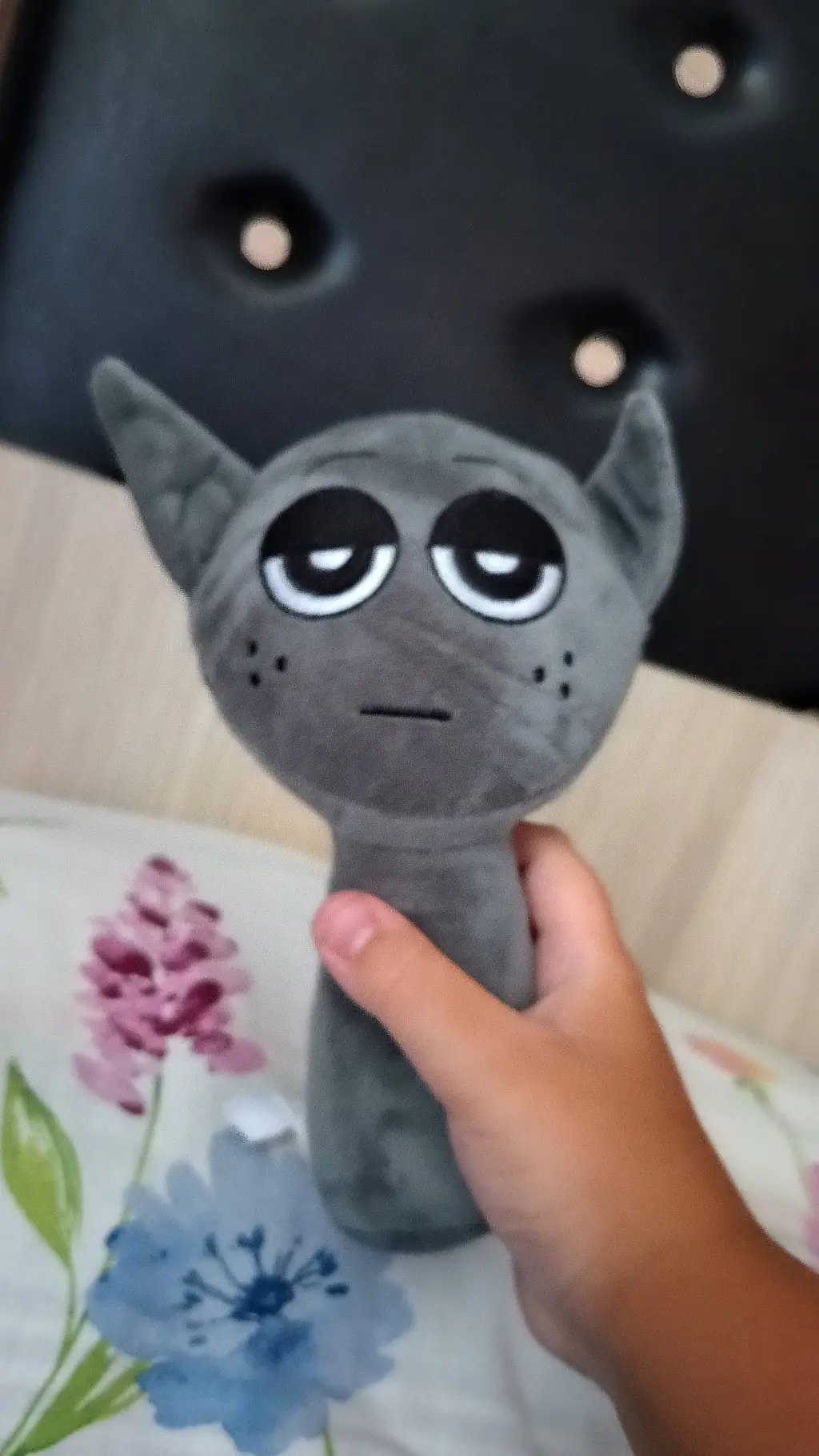ai character: Gray plushie background
