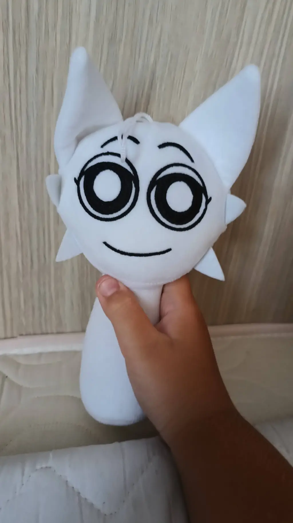 ai character: wenda plushie background