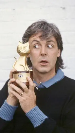 ai character: Paul McCartney background
