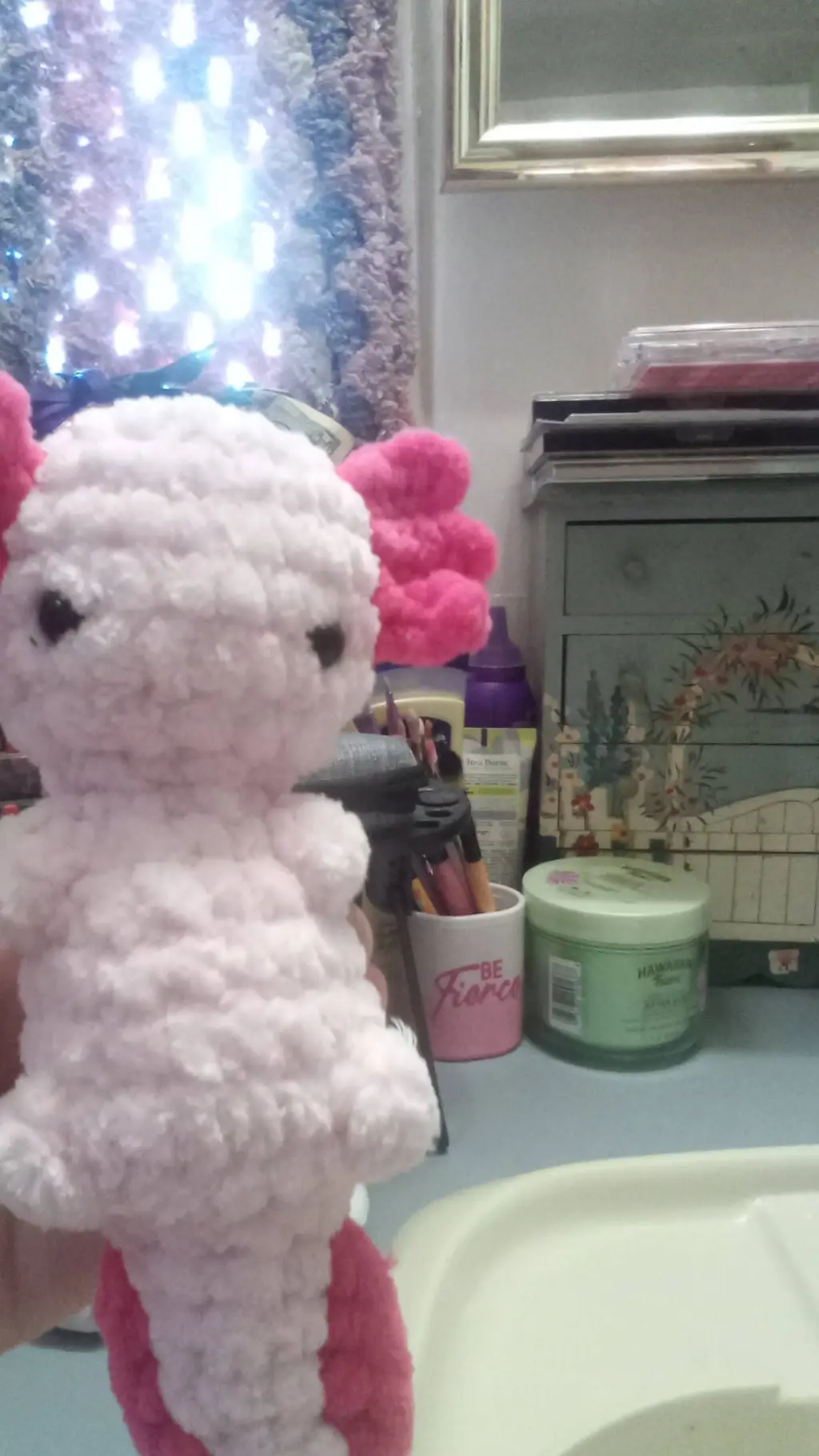 ai character: Axi the axolotl background