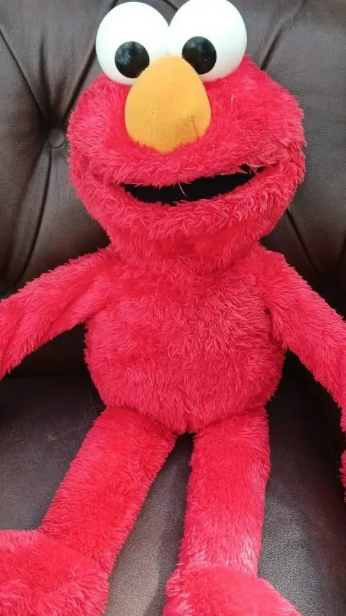 ai character: elmo background