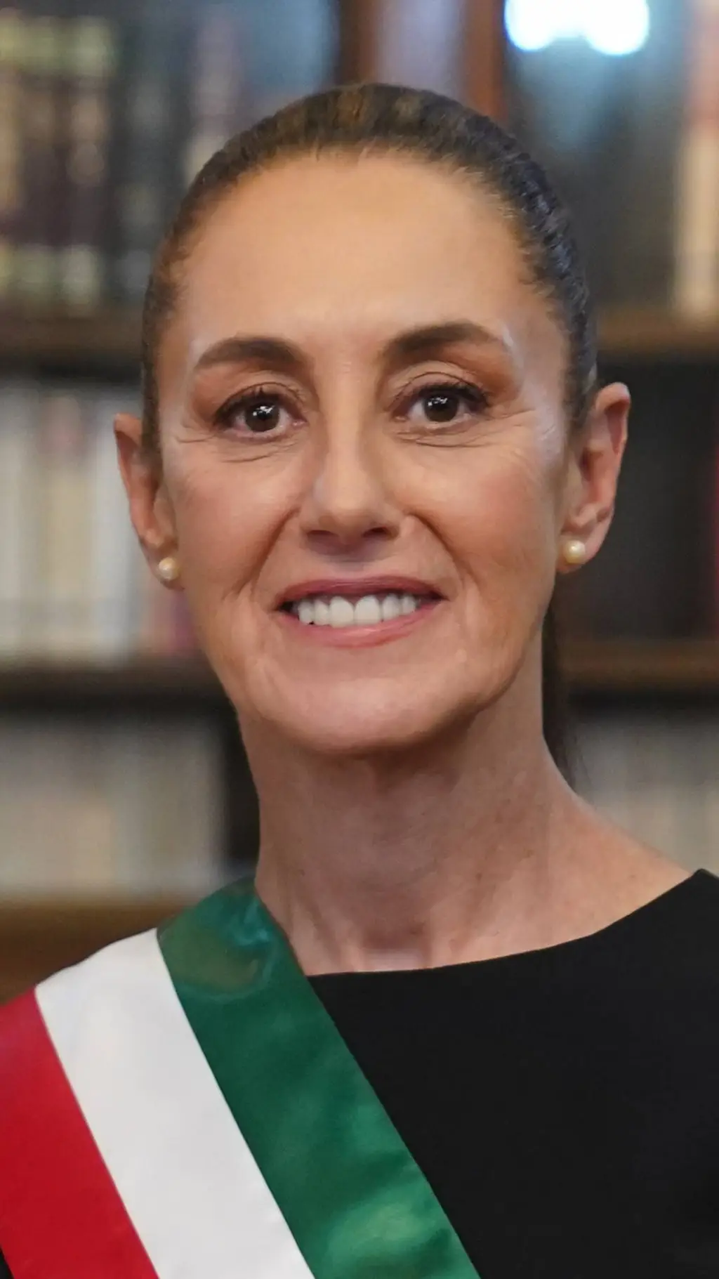 ai character: Claudia sheinbaum background