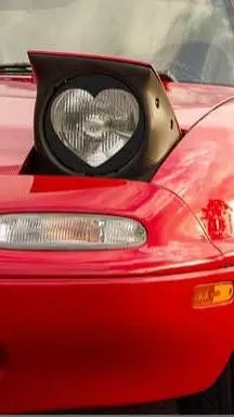ai character: Mazda Miata MX-5NA background