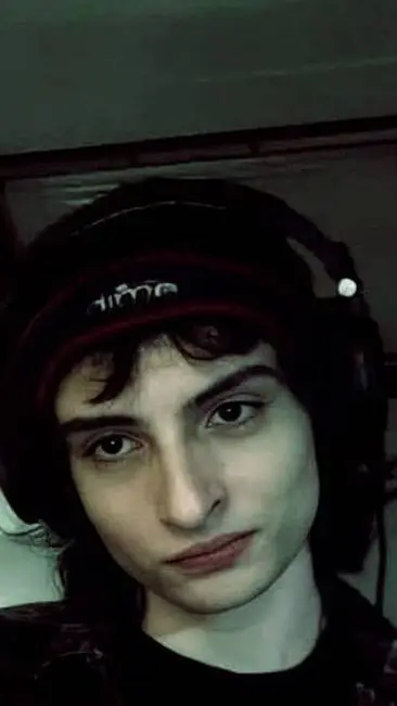 ai character: finn wolfhard  background