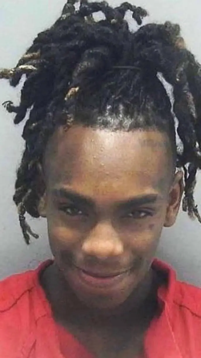 ai character: YNW Melly background