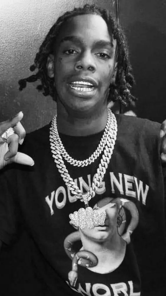 ai character: YNW Melly background