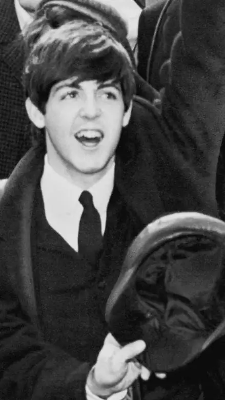 ai character: Paul McCartney  background