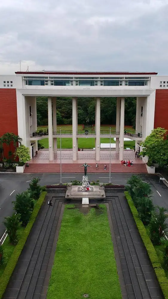 ai character: UP Diliman background