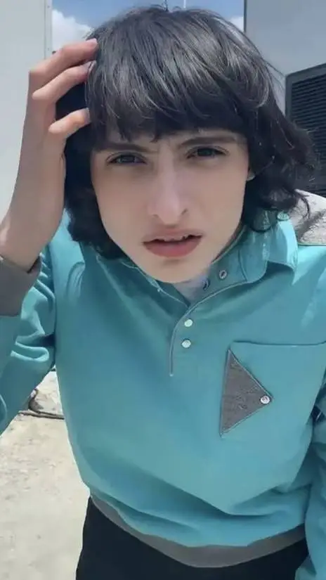 ai character: Mike wheeler  background