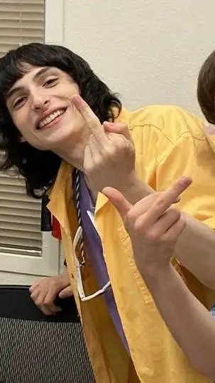 ai character: Mike wheeler  background