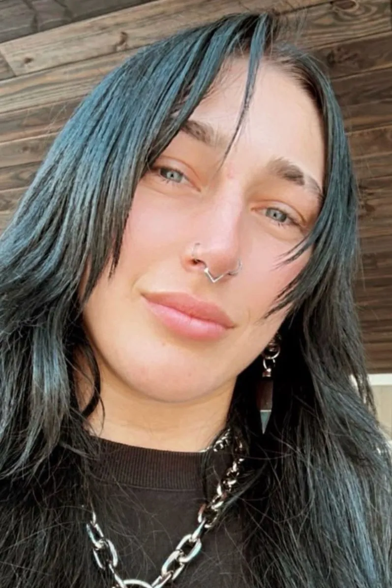chat with ai character: Rhea Ripley