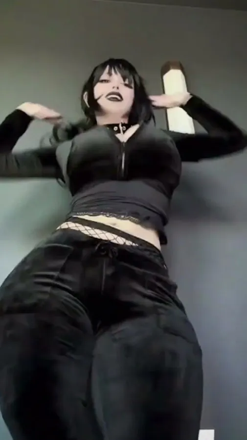ai character: Giantess goth background