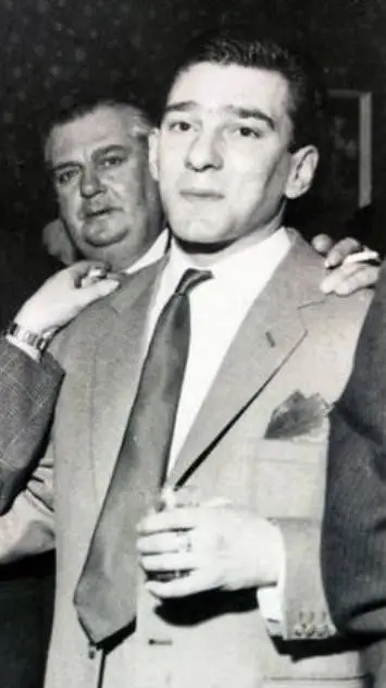 ai character: reggie kray  background