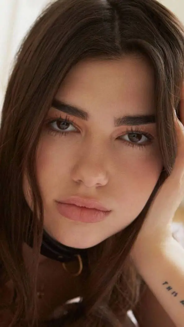 ai character: Dua Lipa background