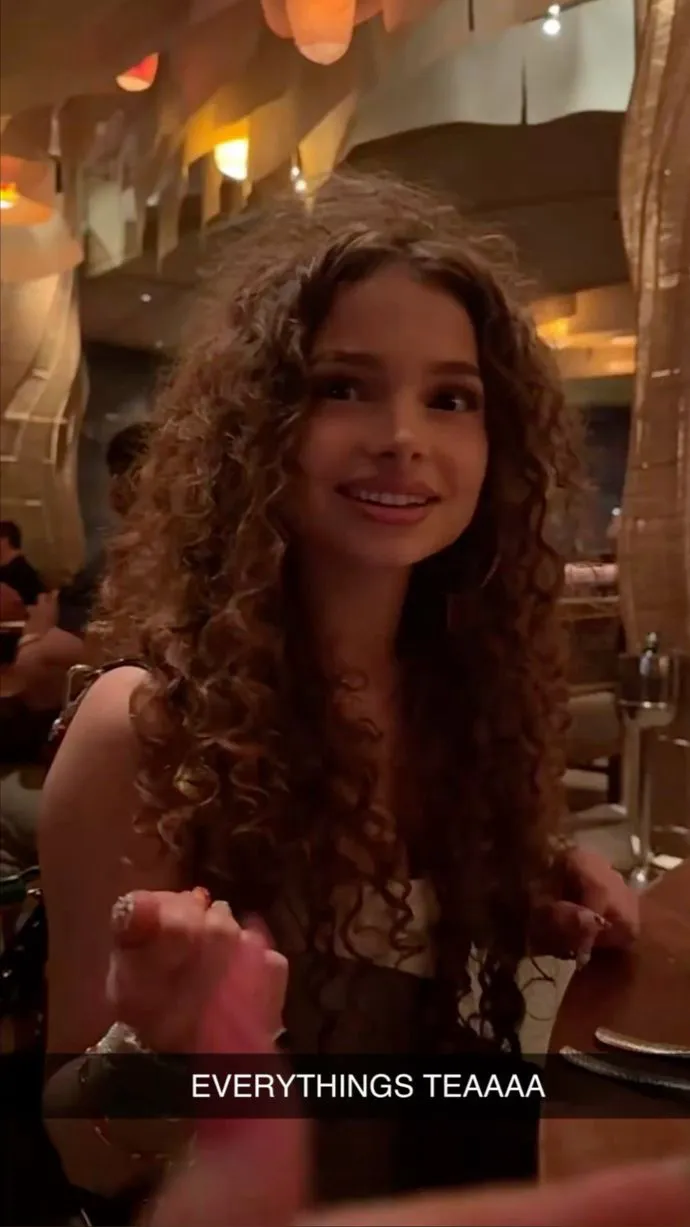 ai character: Sunday kalogeras  background