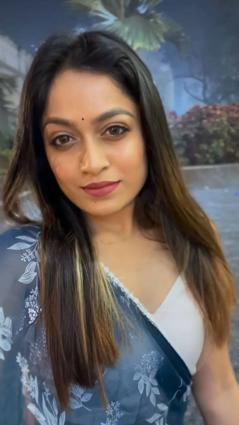ai character: Amrutha background