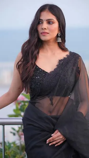 ai character: Malavika background
