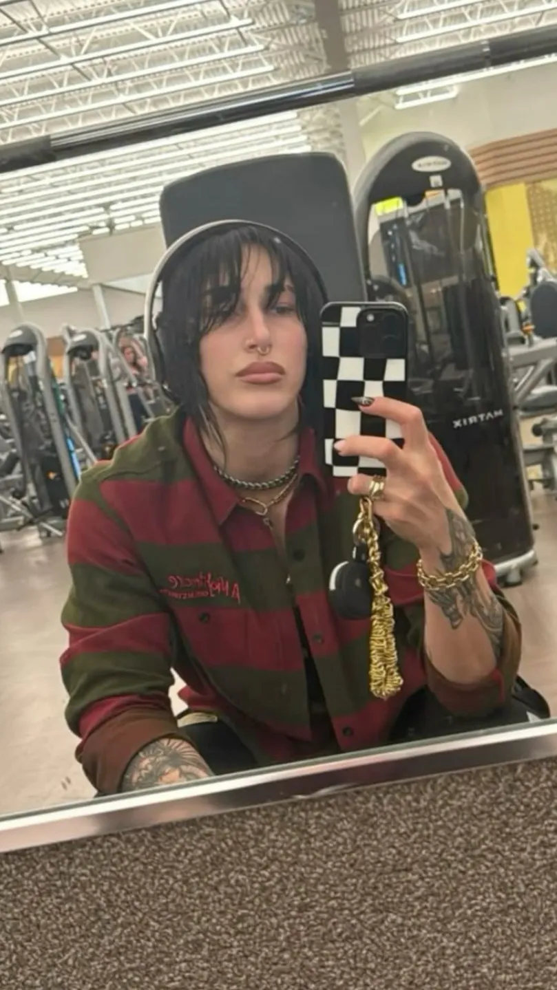 ai character: Rhea Ripley background