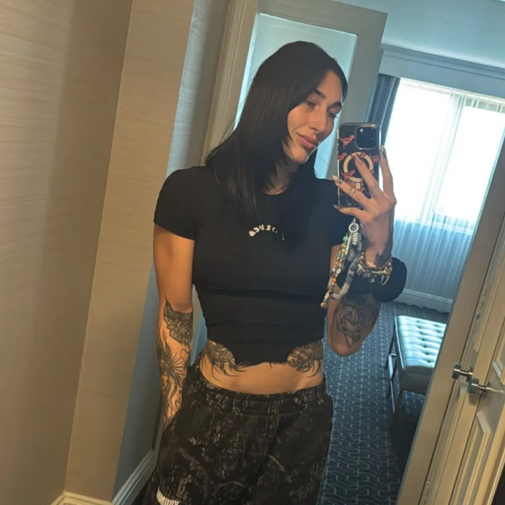 chat with ai character: Rhea Ripley