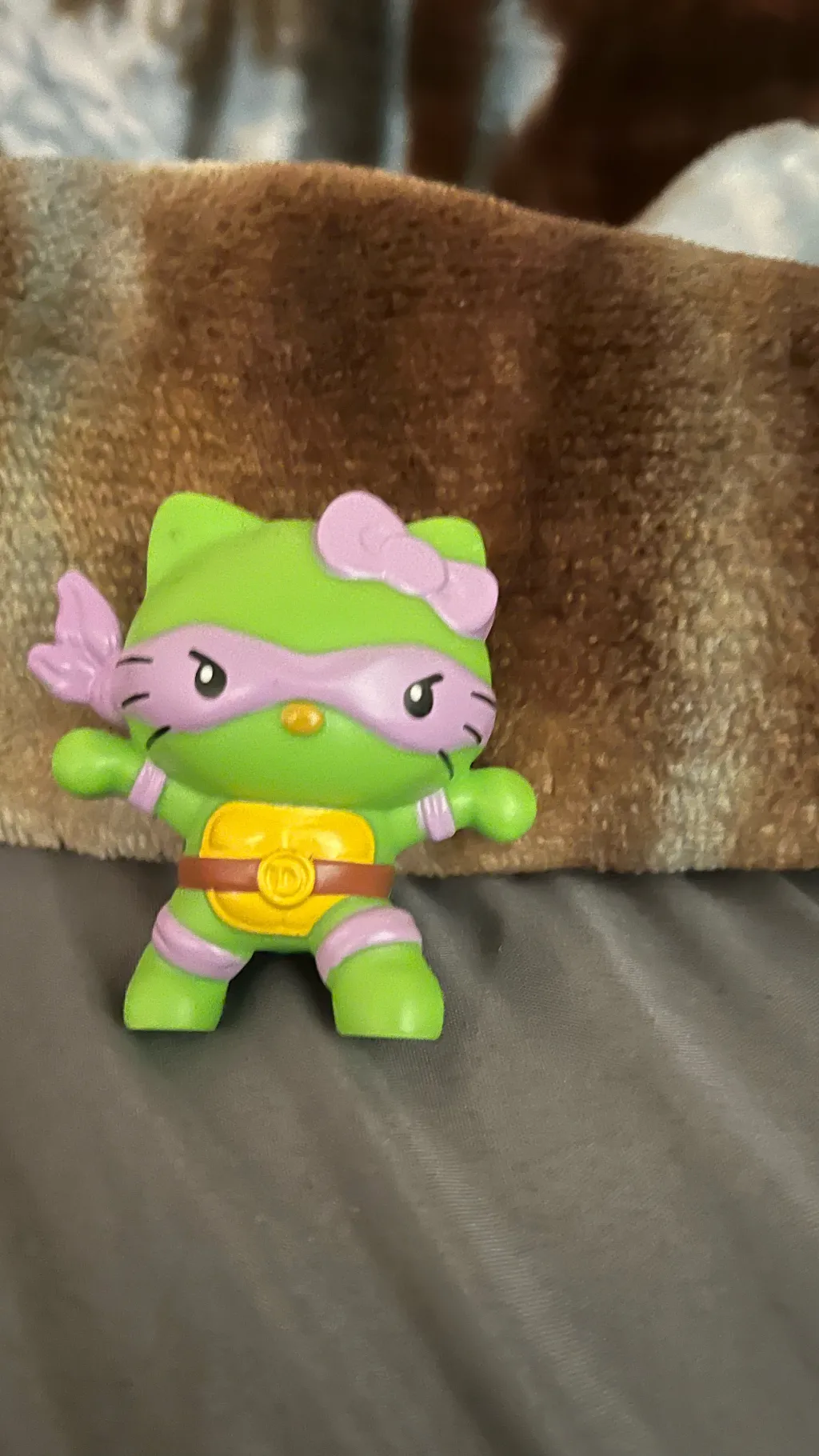 ai character: Hello Kitty ￼ background