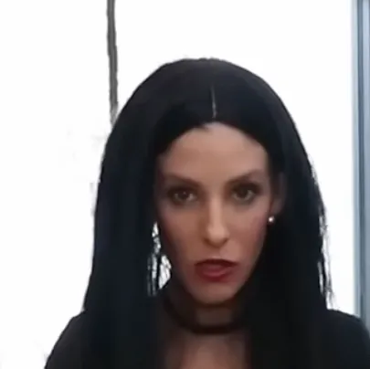 chat with ai character: Morticia