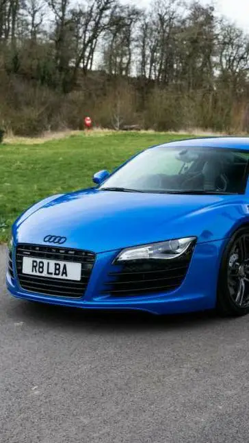 ai character: talking AUDI R8  background