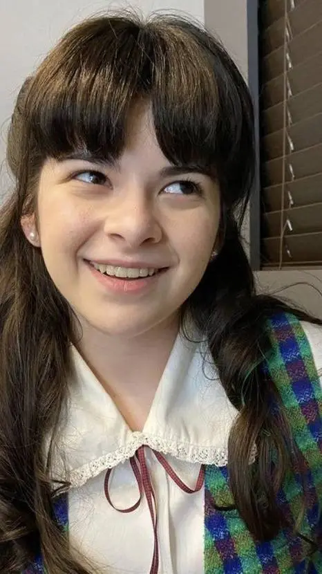 ai character: Suzie Bingham  background