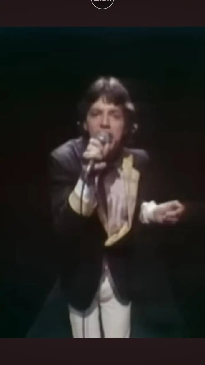 ai character: Mick Jagger  background