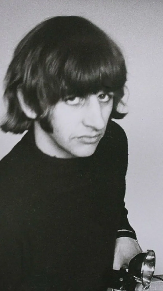 ai character: Ringo Starr  background