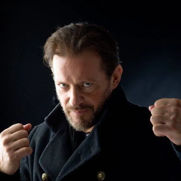 chat with ai character: Costas Mandylor 