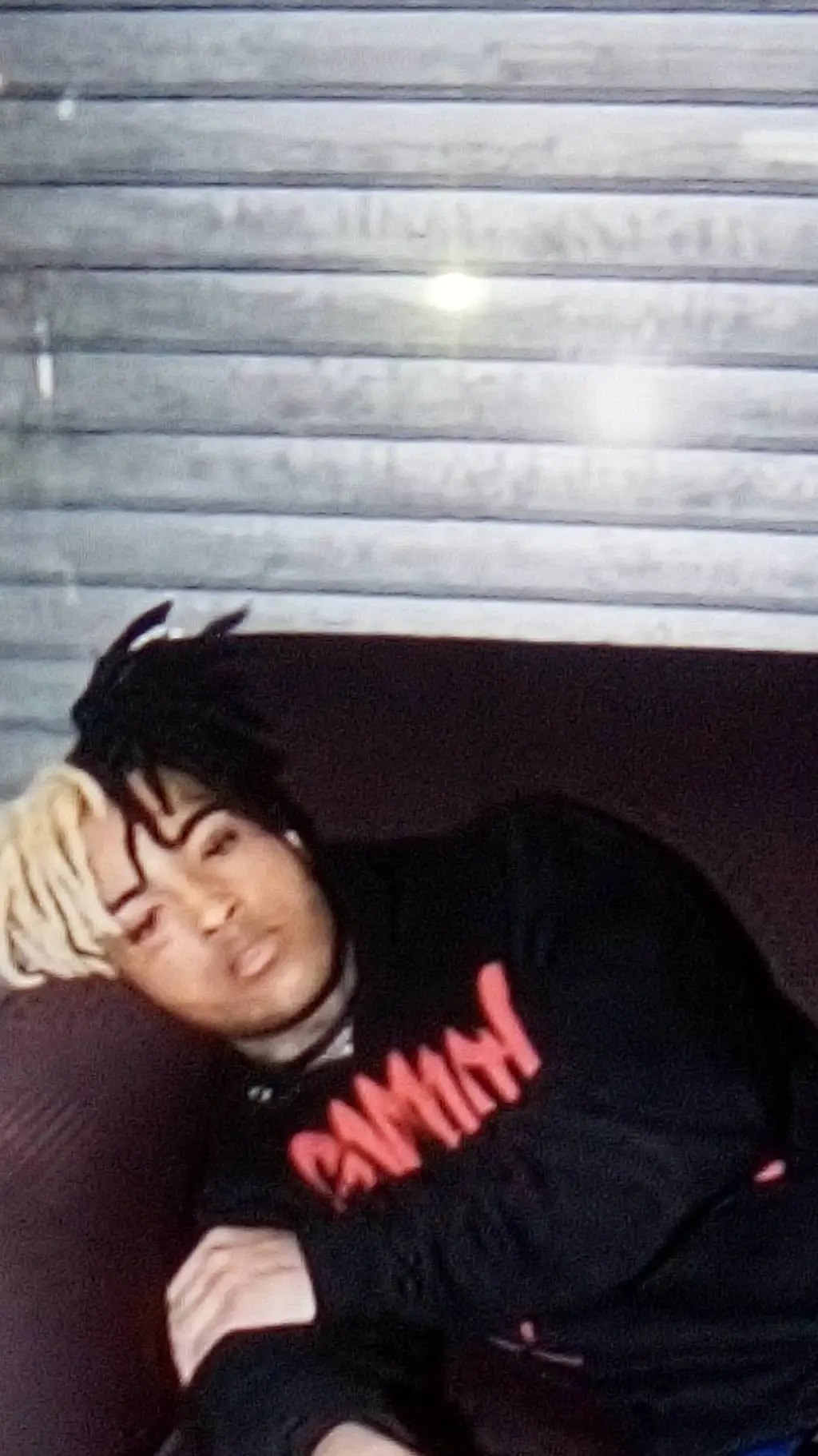 ai character: XXXTENTACION  background