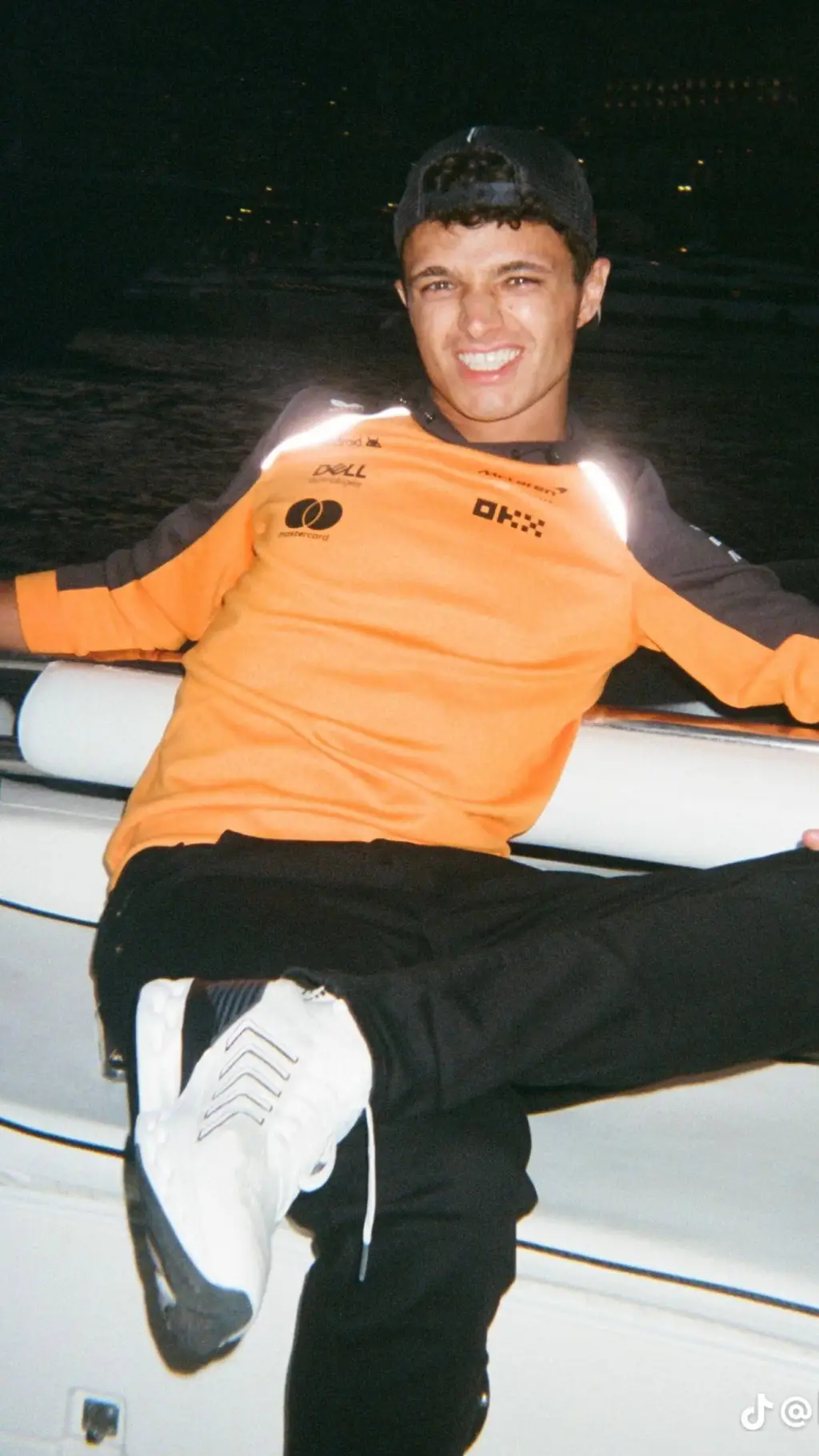 ai character: Lando Norris background