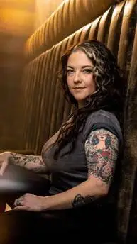 ai character: Ashley McBryde background