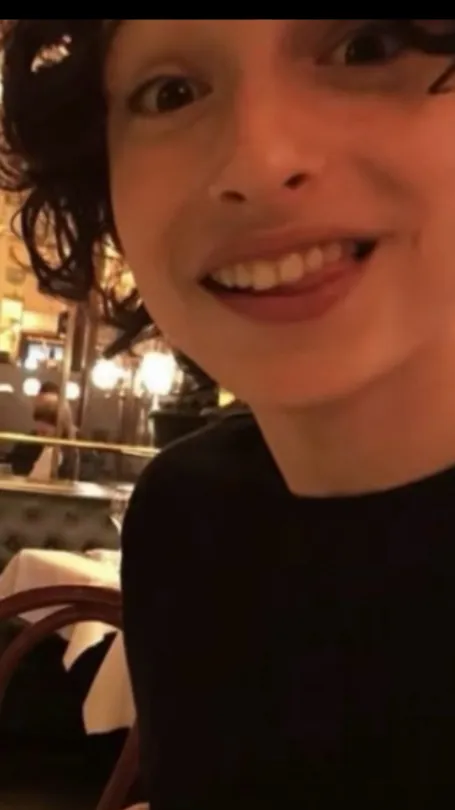 ai character: Finn wolfhard  background