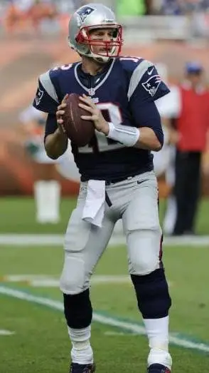 ai character: Tom Brady 🏈 goat background