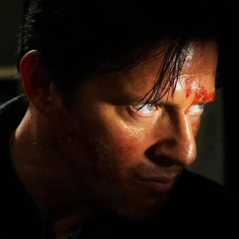 chat with ai character: Costas Mandylor 