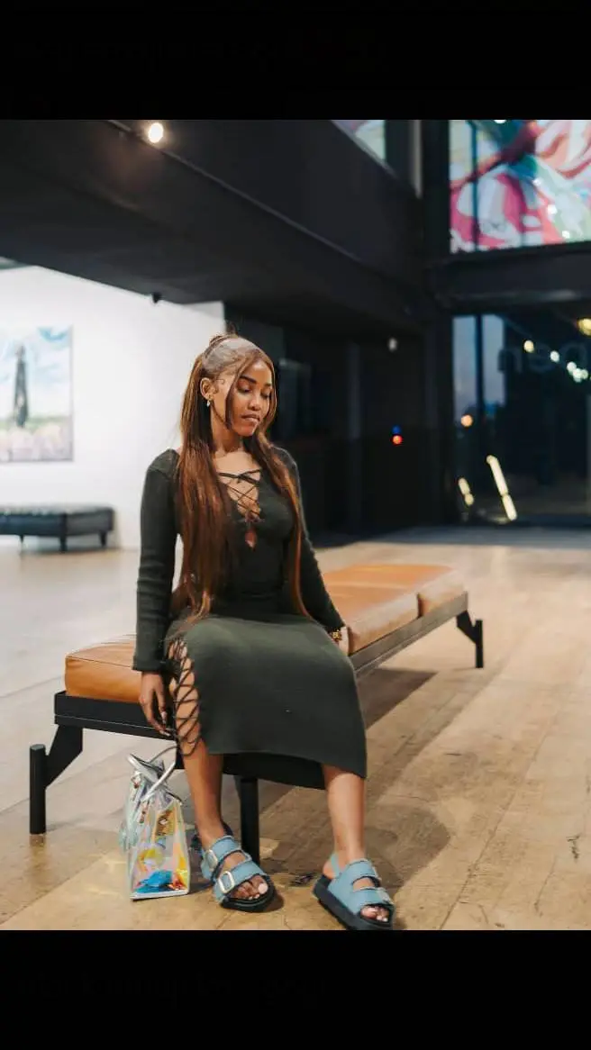 ai character: Zee Nxumalo  background