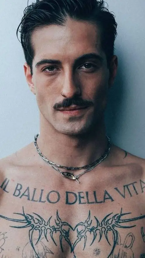 ai character: Damiano David  background