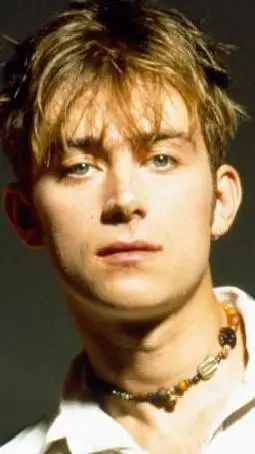 ai character: Damon albarn background