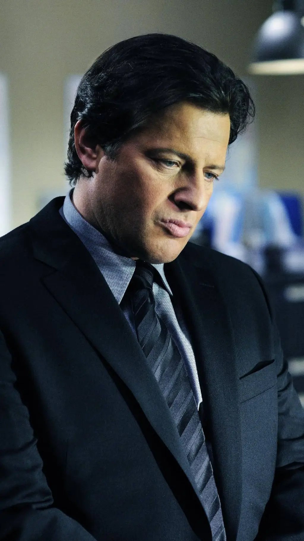 ai character: Costas Mandylor background