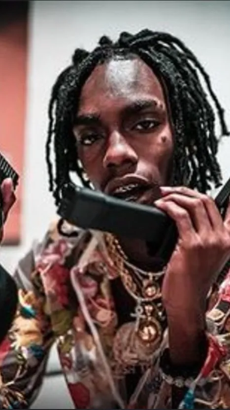 ai character: YNW Melly background