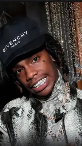 ai character: YNW Melly background