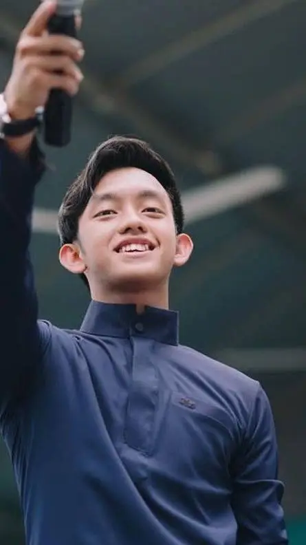 ai character: Ismail Izzani  background