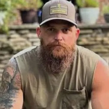 chat with ai character: Adam Calhoun